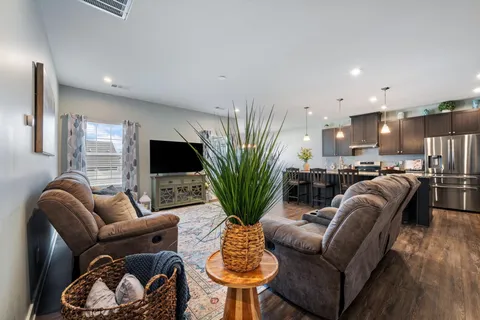 a dining room with furniture window wooden floor