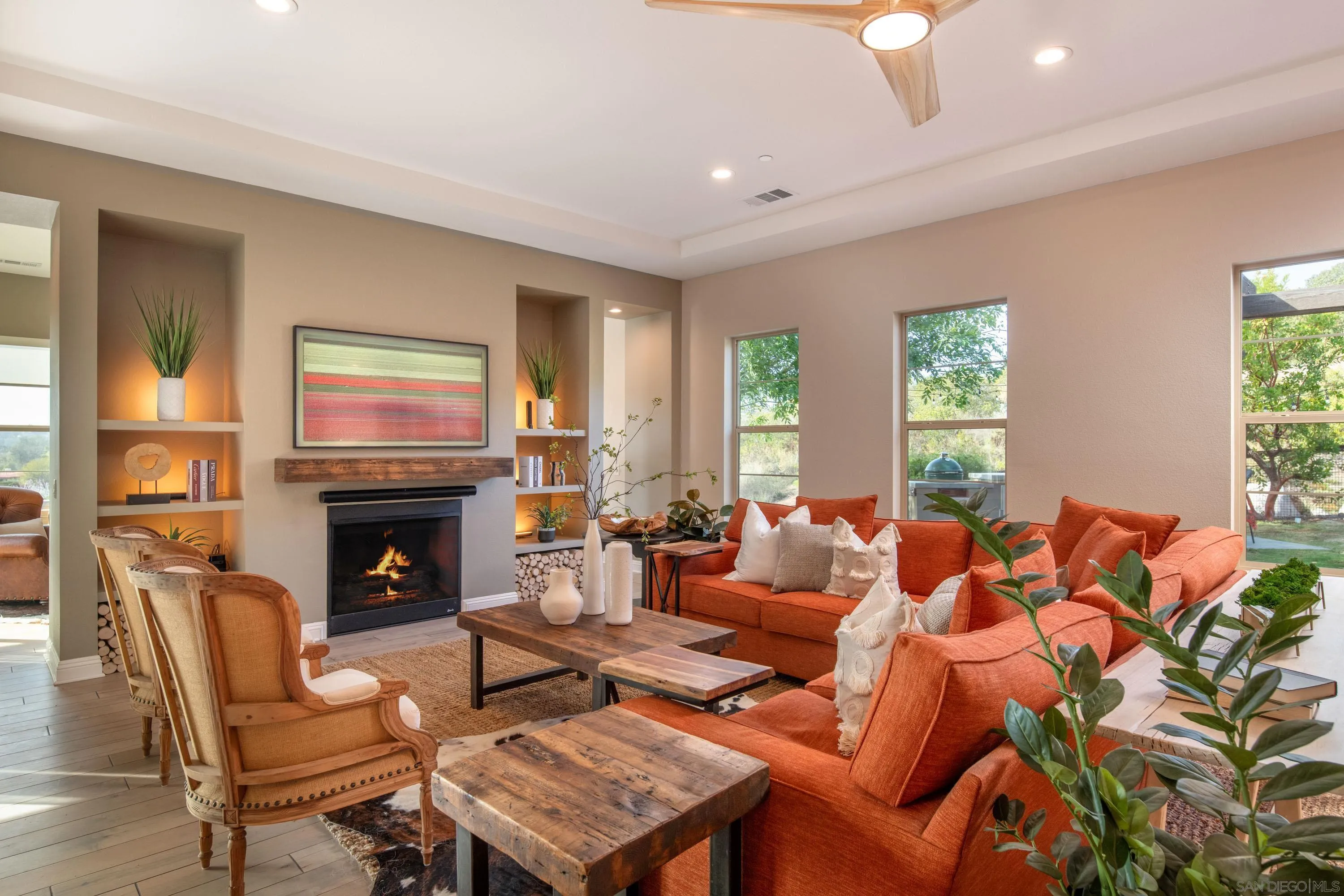 14516 Highcrest Court Poway, CA 92064 - Photo 23 of 71 a living room with furniture a fireplace and a window