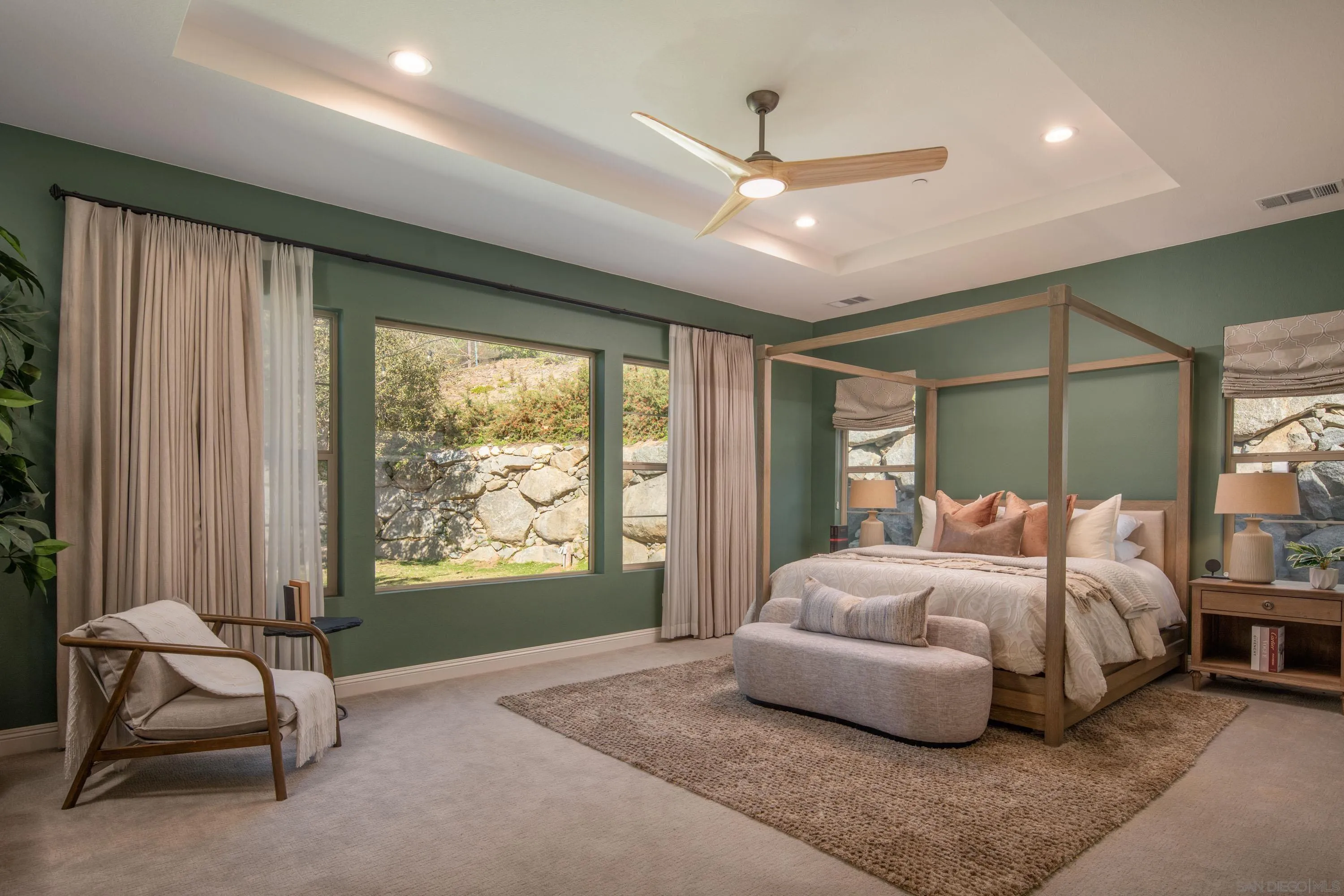 14516 Highcrest Court Poway, CA 92064 - Photo 27 of 71 a spacious bedroom with a bed and large windows