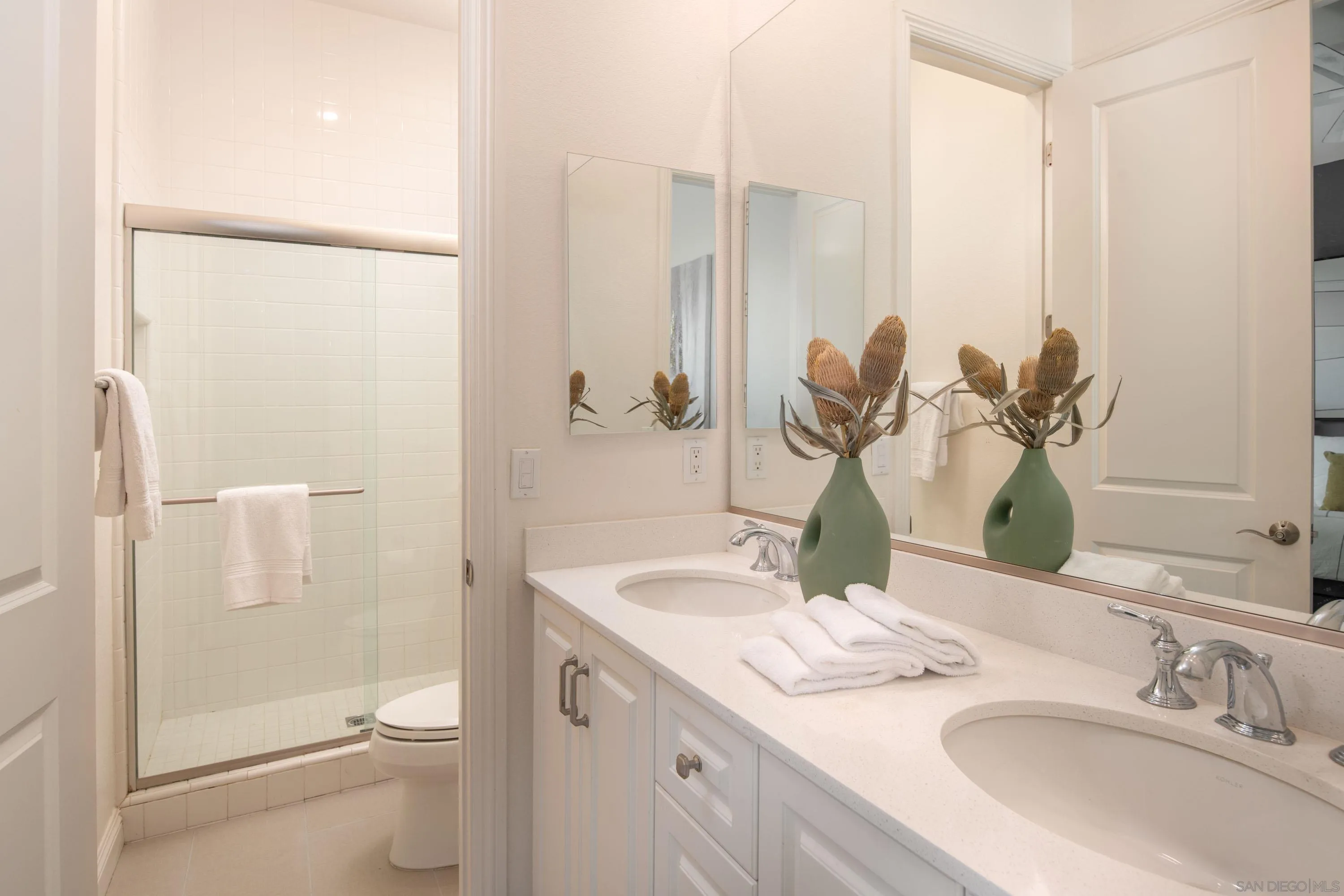 14516 Highcrest Court Poway, CA 92064 - Photo 32 of 71 a bathroom with a granite countertop sink a toilet and shower