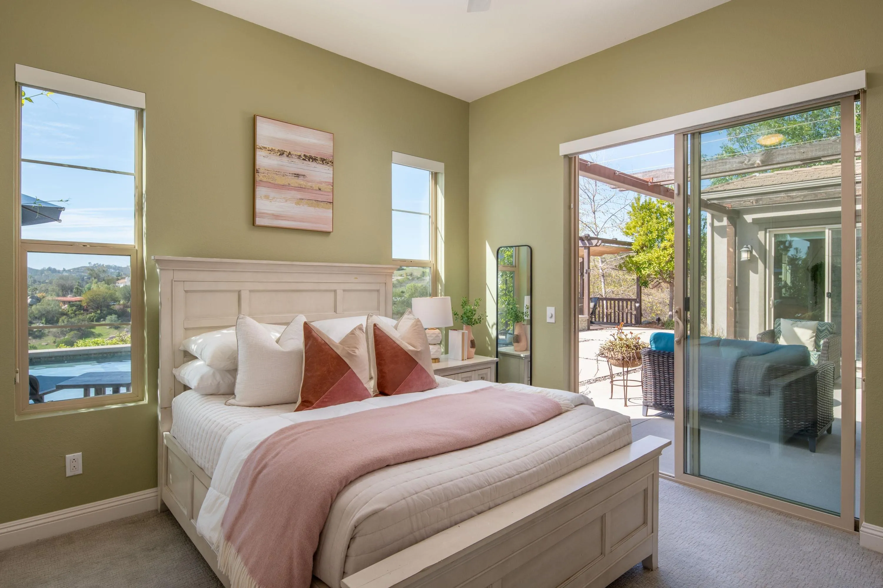 14516 Highcrest Court Poway, CA 92064 - Photo 34 of 71 a bedroom with a large bed and a balcony next to a window