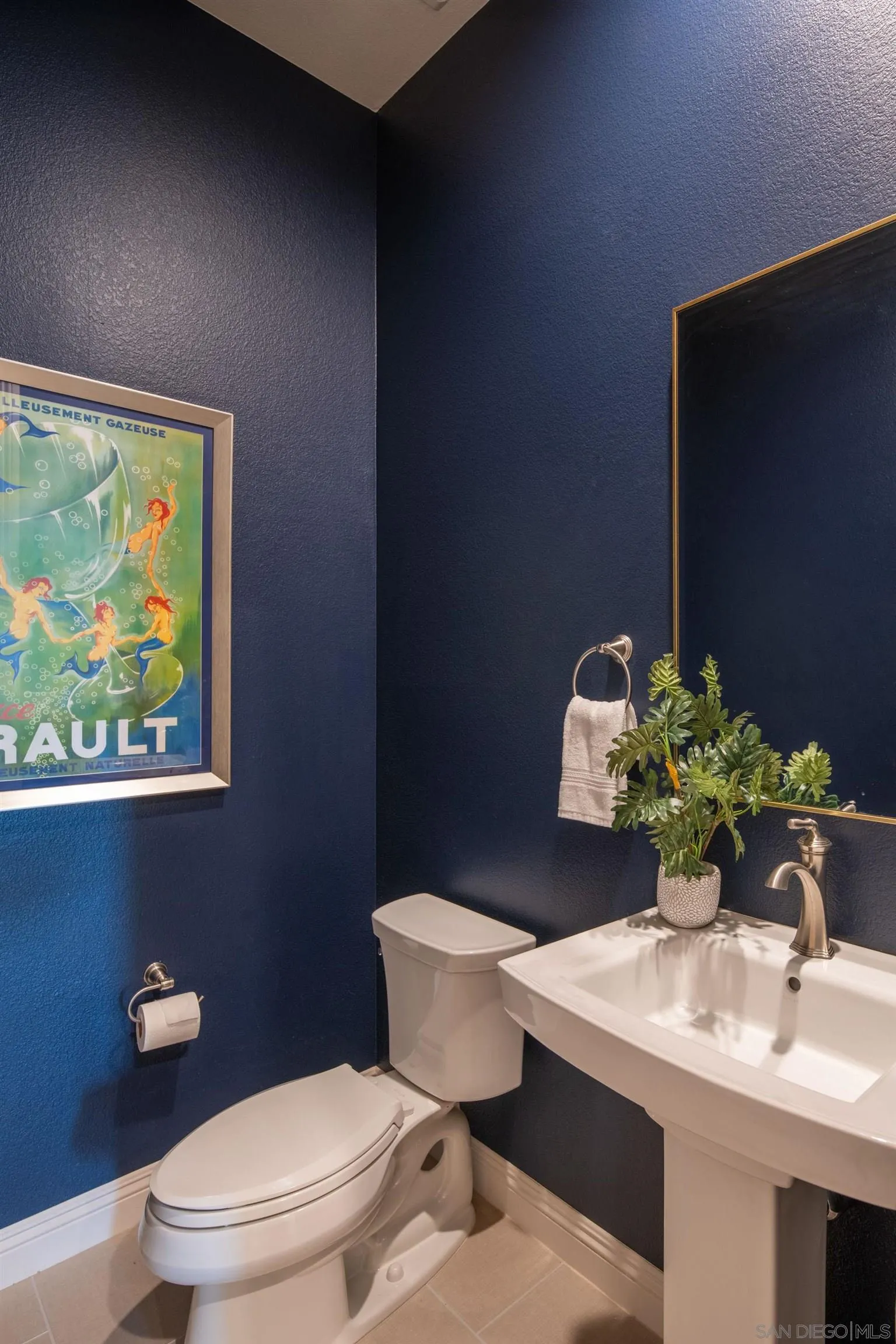 14516 Highcrest Court Poway, CA 92064 - Photo 35 of 71 a bathroom with a toilet a sink and mirror