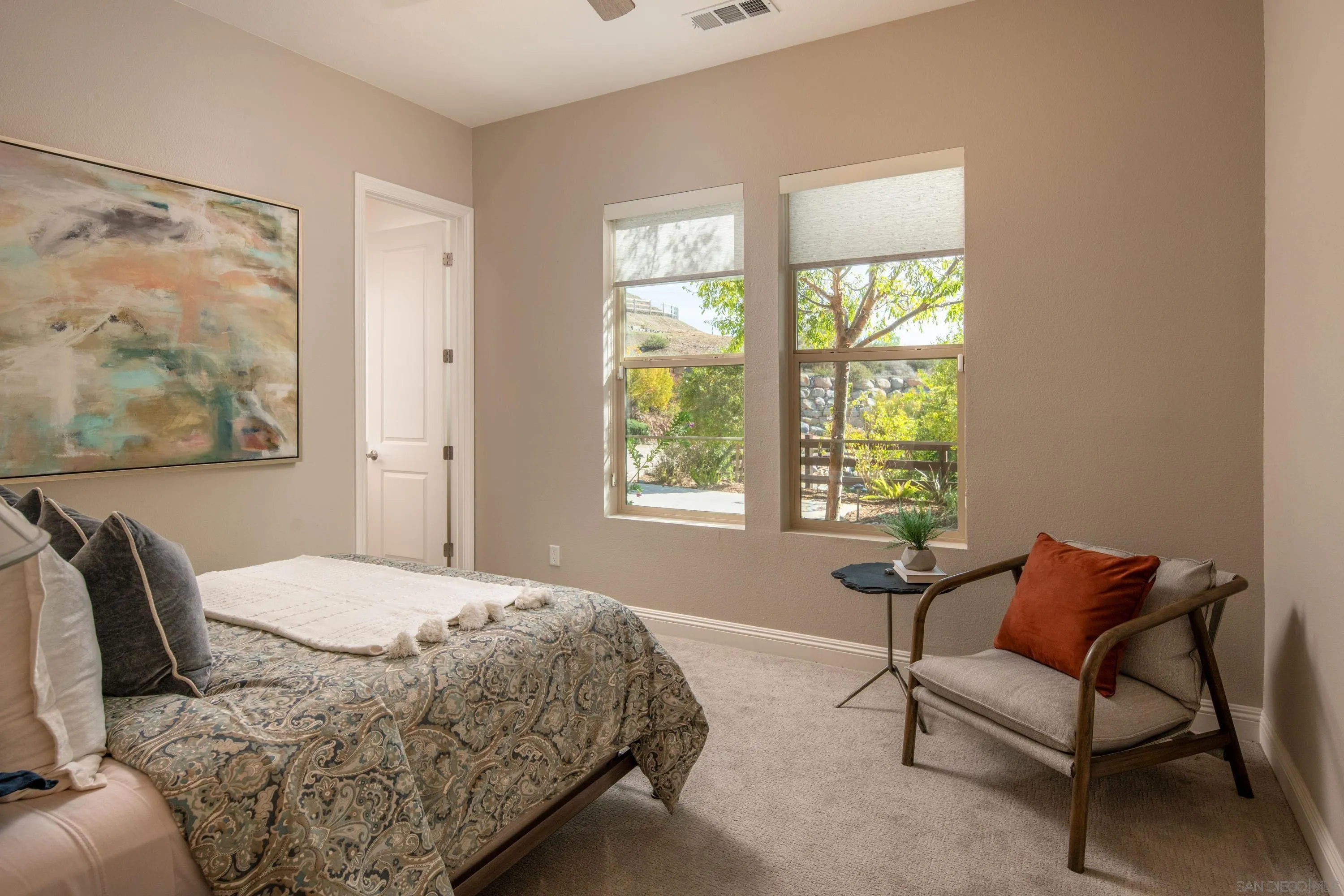 14516 Highcrest Court Poway, CA 92064 - Photo 36 of 71 a bedroom with a bed and a couch