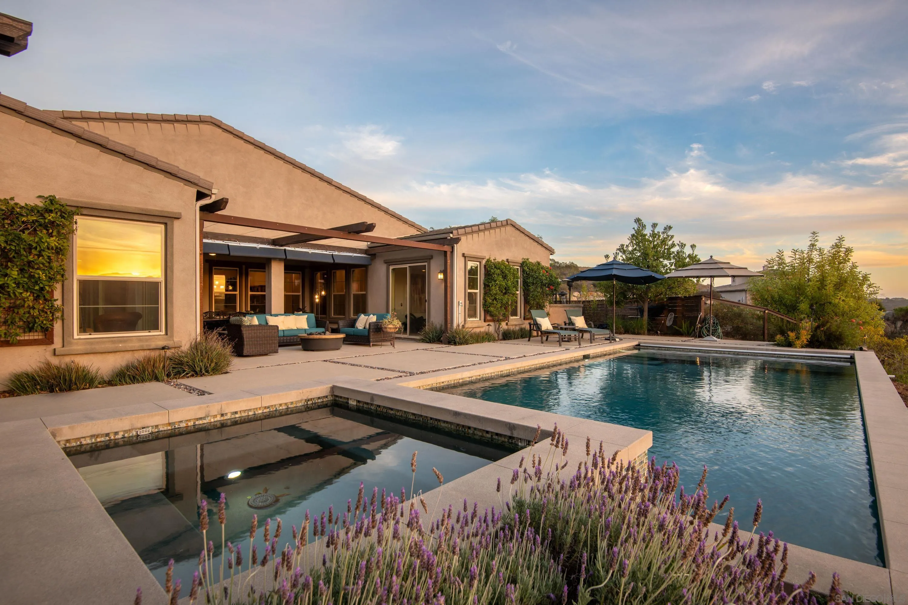 14516 Highcrest Court Poway, CA 92064 - Photo 41 of 71 a view of a patio with swimming pool table and chairs