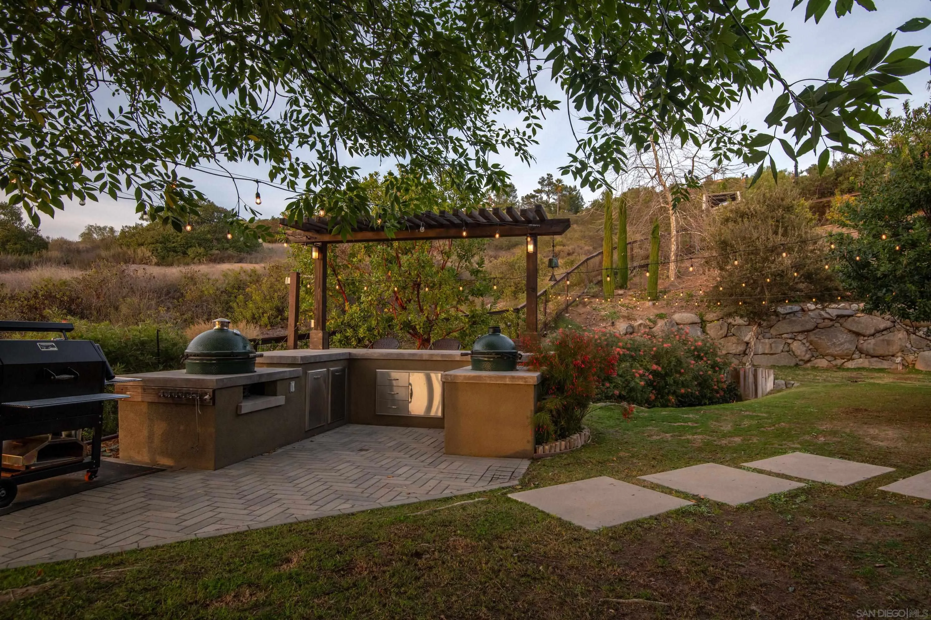 14516 Highcrest Court Poway, CA 92064 - Photo 44 of 71 a view of a terrace with a garden