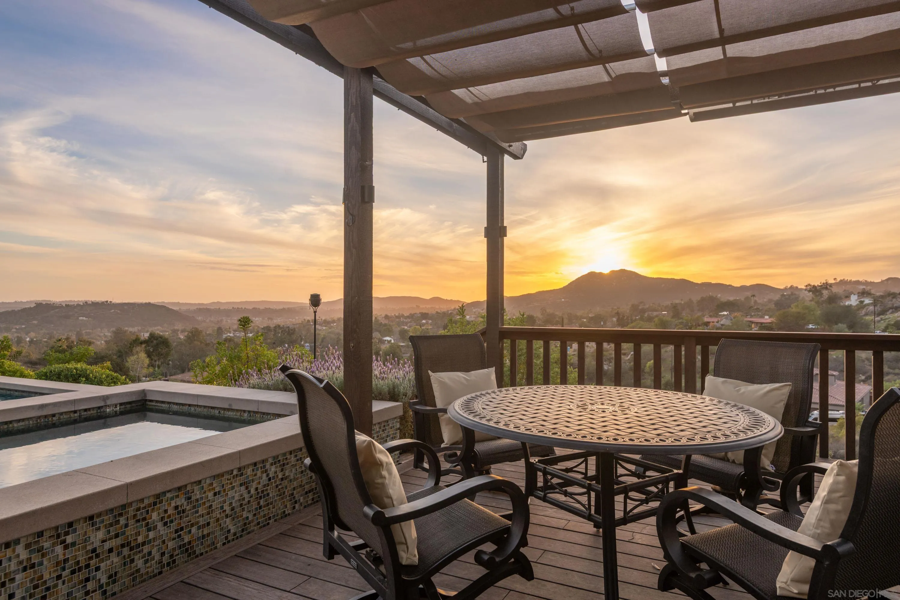 14516 Highcrest Court Poway, CA 92064 - Photo 46 of 71 a view of a balcony with a table and chairs