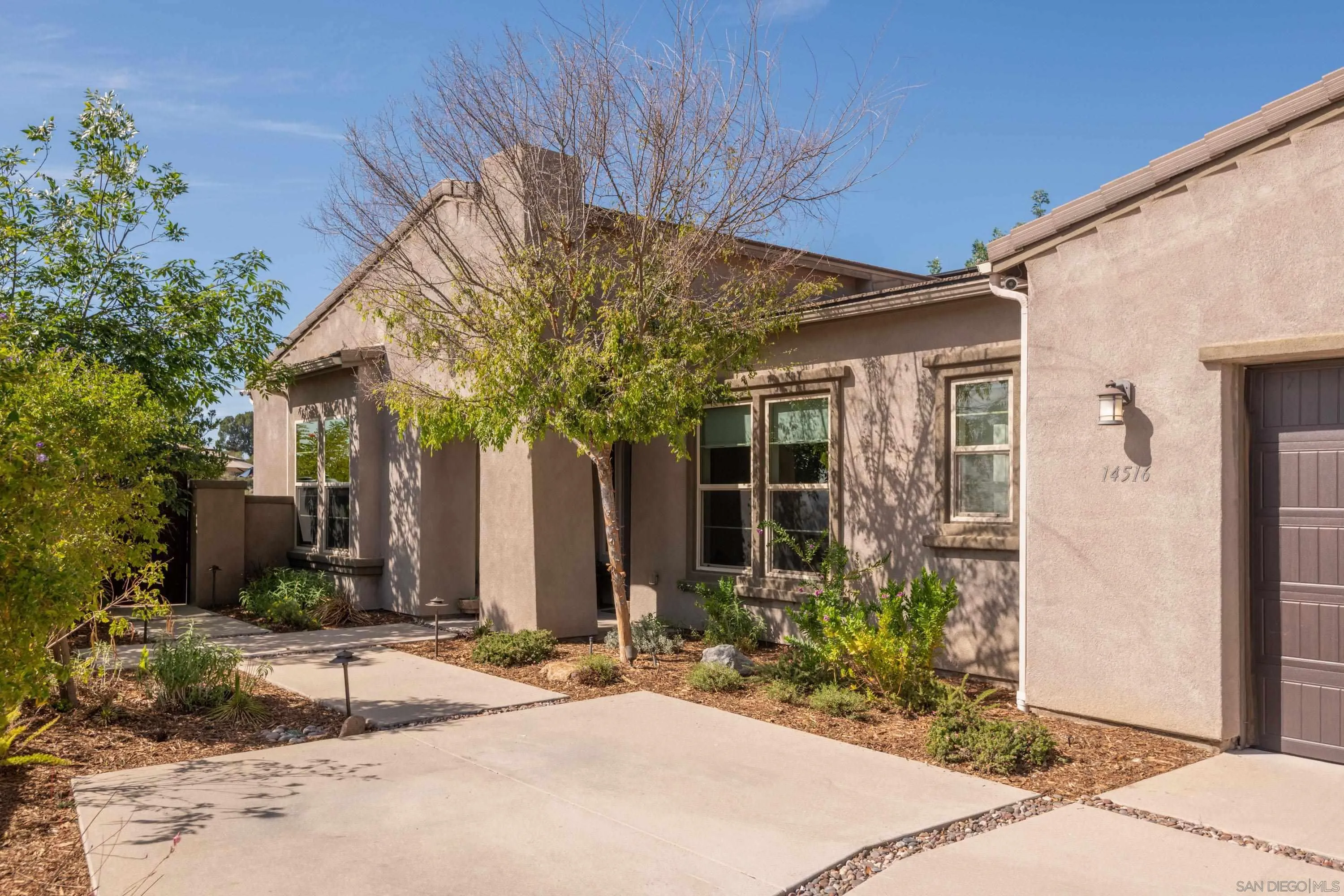 14516 Highcrest Court Poway, CA 92064 - Photo 50 of 71 a front view of a house with garden