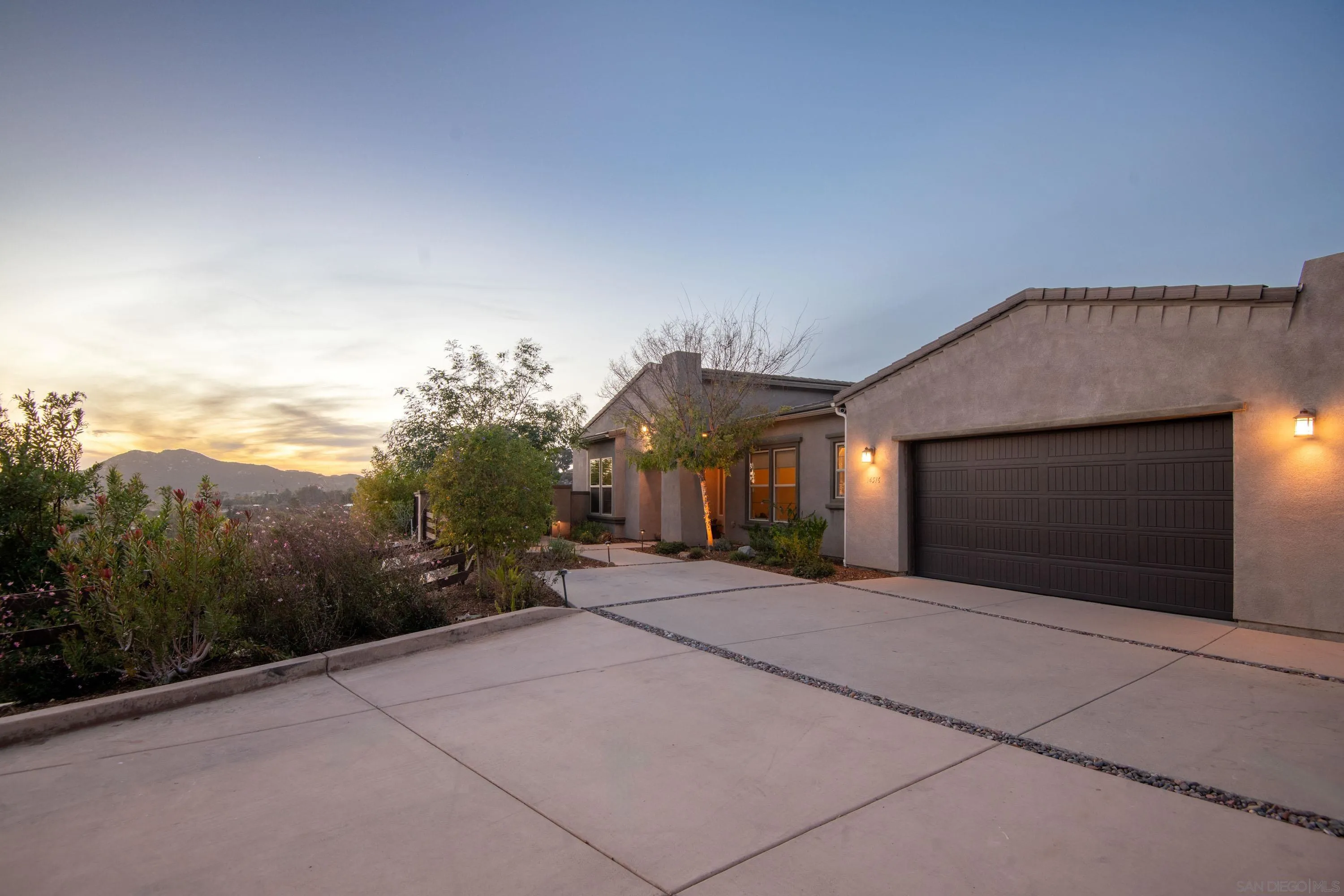 14516 Highcrest Court Poway, CA 92064 - Photo 65 of 71 a view of a house with a yard and garage