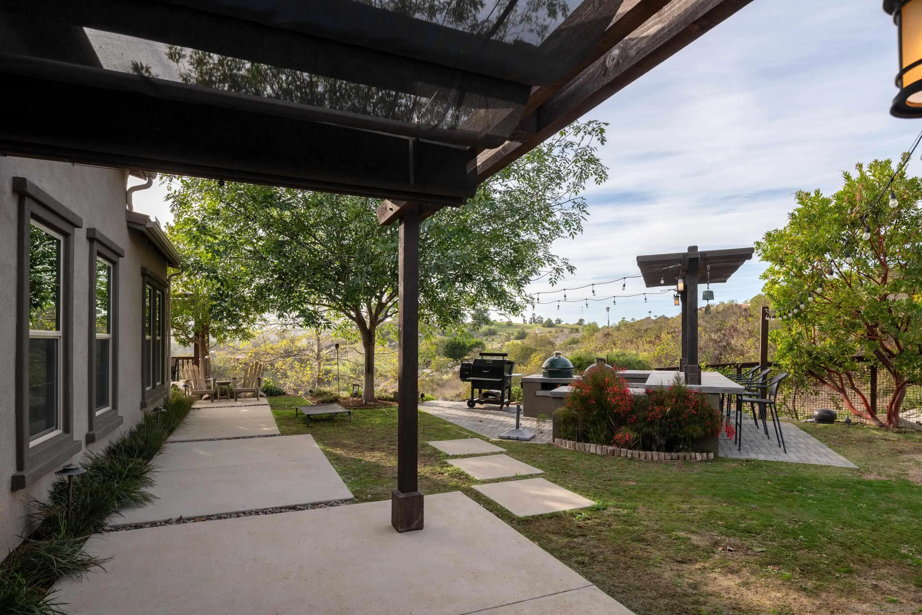 14516 Highcrest Court Poway, CA 92064 - Photo 69 of 71 a view of a porch with furniture and a yard