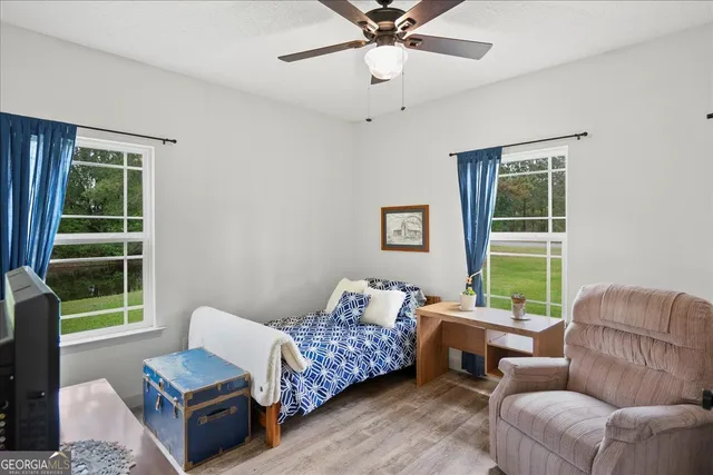 a en suite bathroom with a sink a toilet and shower