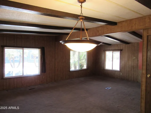 a bathroom with a toilet sink and a shower curtain