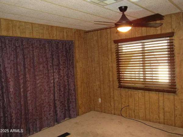 a view of a room that has a window in it