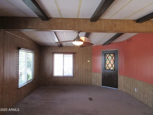 an empty room with windows