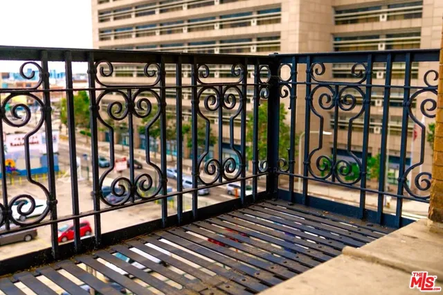 a view of a street with an outdoor space
