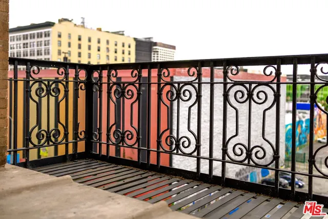 a front view of a door with wooden stairs