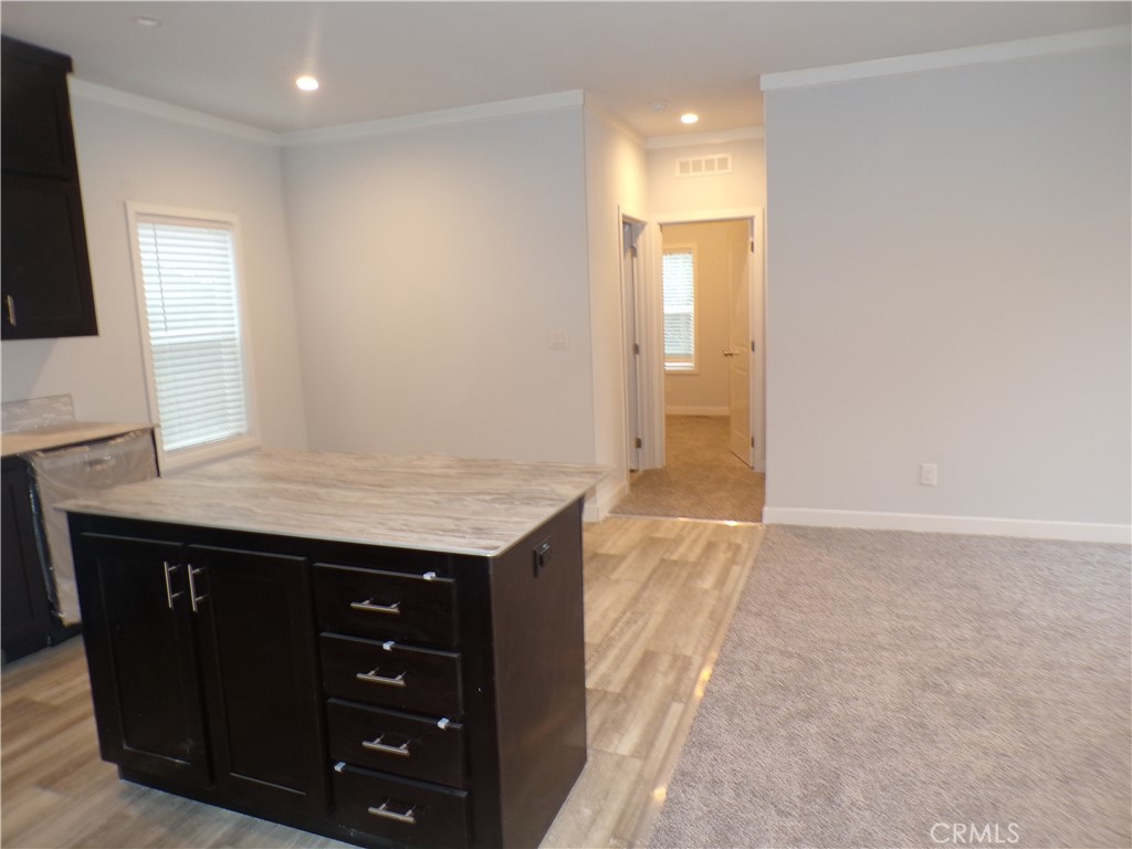 13586 Fair Oak Road Clearlake, CA 95422 - Photo 14 of 15 a bathroom with a granite countertop sink and a mirror