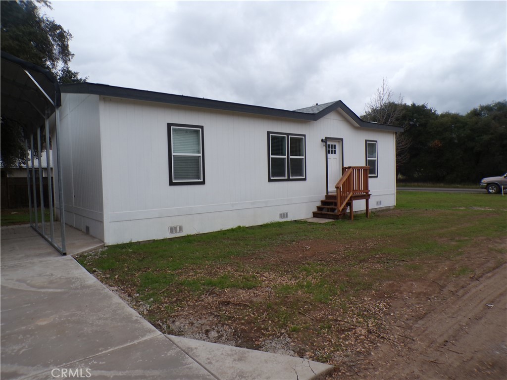 13586 Fair Oak Road Clearlake, CA 95422 - Photo 4 of 15 a view of a backyard of the house