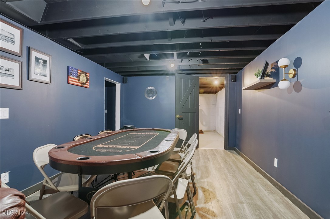 9278 Bryant Road Windham, OH 44288 - Photo 33 of 47 Rec room featuring wood finished floors and baseboards