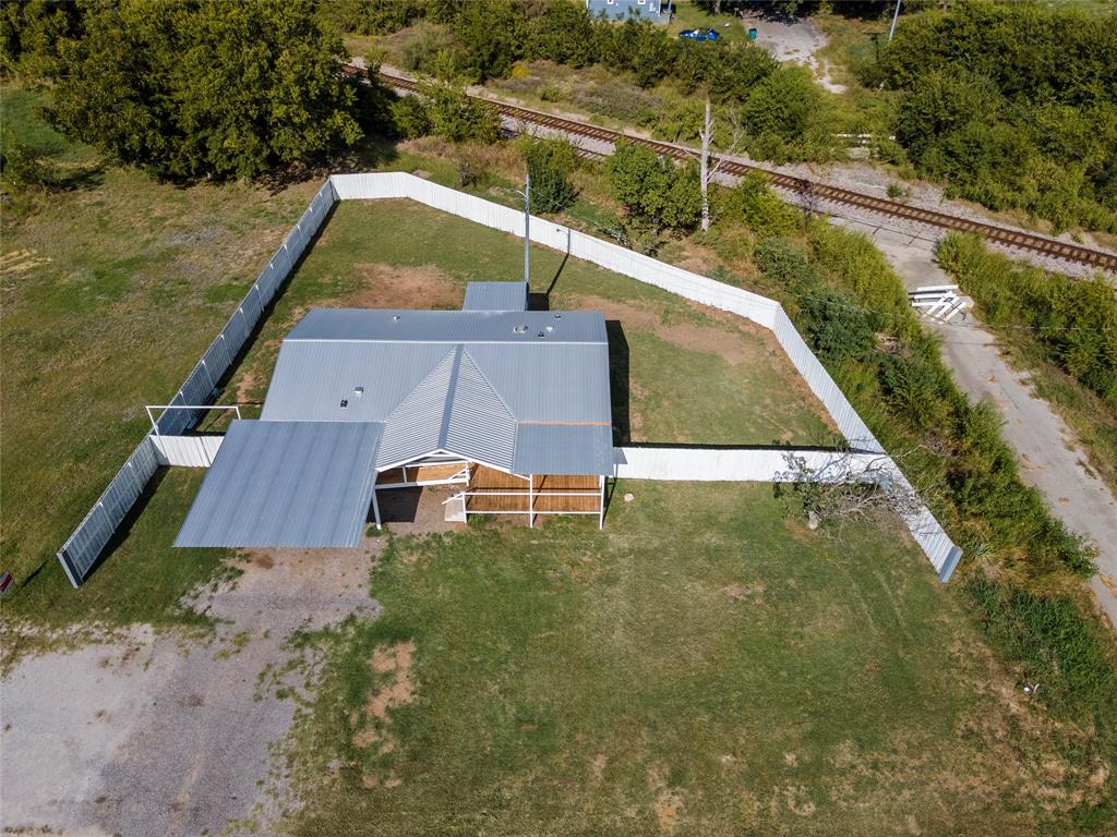 401 Barker Street Bowie, TX 76230 - Photo 24 of 24 a view of a back yard