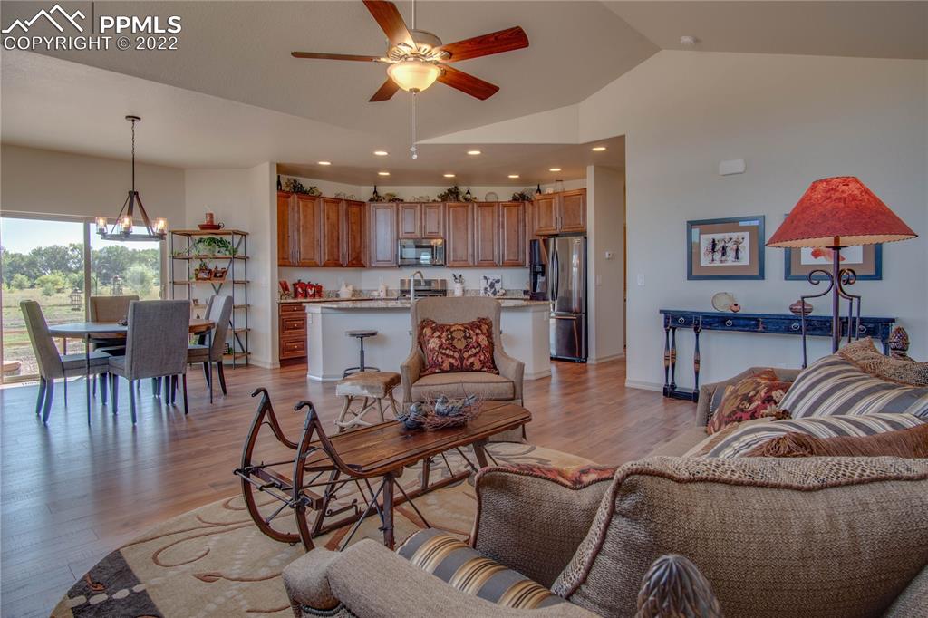 124 Rocchio Drive Florence, CO 81226 - Photo 8 of 34 a living room with furniture and kitchen view