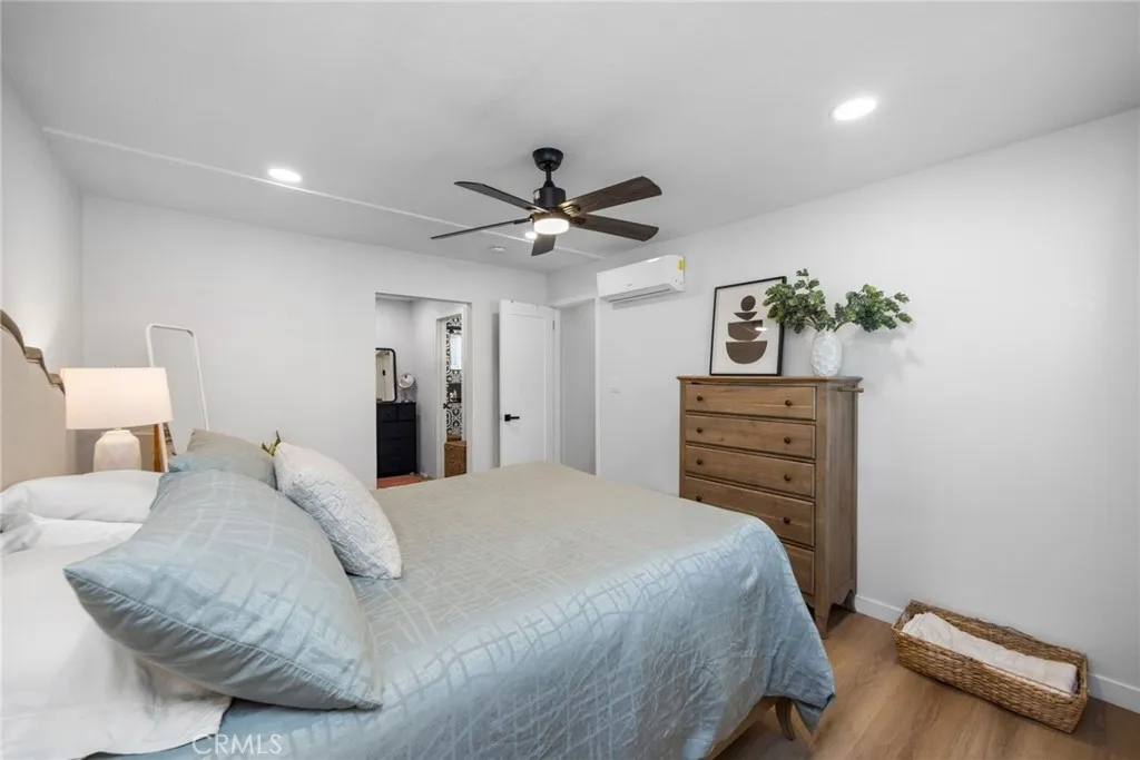 1051 Site, Unit 38 Brea, CA 92821 - Photo 25 of 45 a bedroom with a bed and a ceiling fan