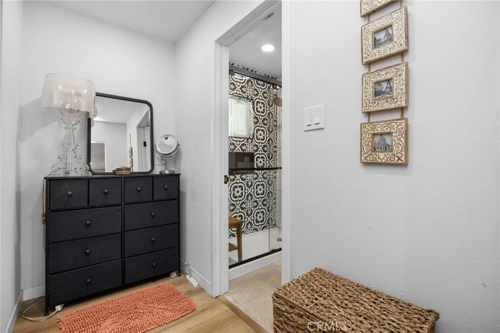 1051 Site, Unit 38 Brea, CA 92821 - Photo 26 of 45 a bathroom with a sink a mirror and a shower
