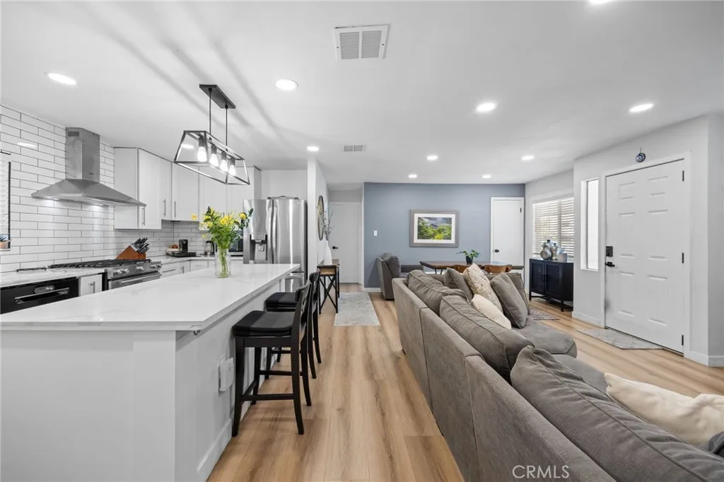 1051 Site, Unit 38 Brea, CA 92821 - Photo 9 of 45 a living room with furniture and a wooden floor