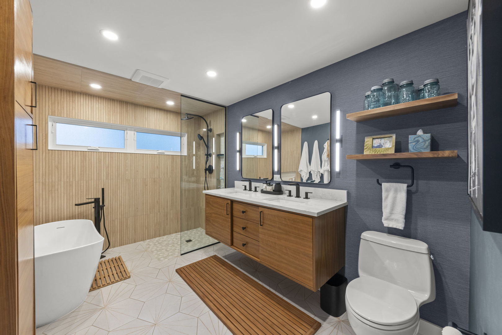 1001 Geneva Road St. Charles, IL 60174 - Photo 11 of 25 a bathroom with a sink a toilet and mirror