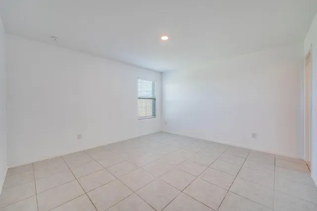 a kitchen with stainless steel appliances a sink stove and cabinets