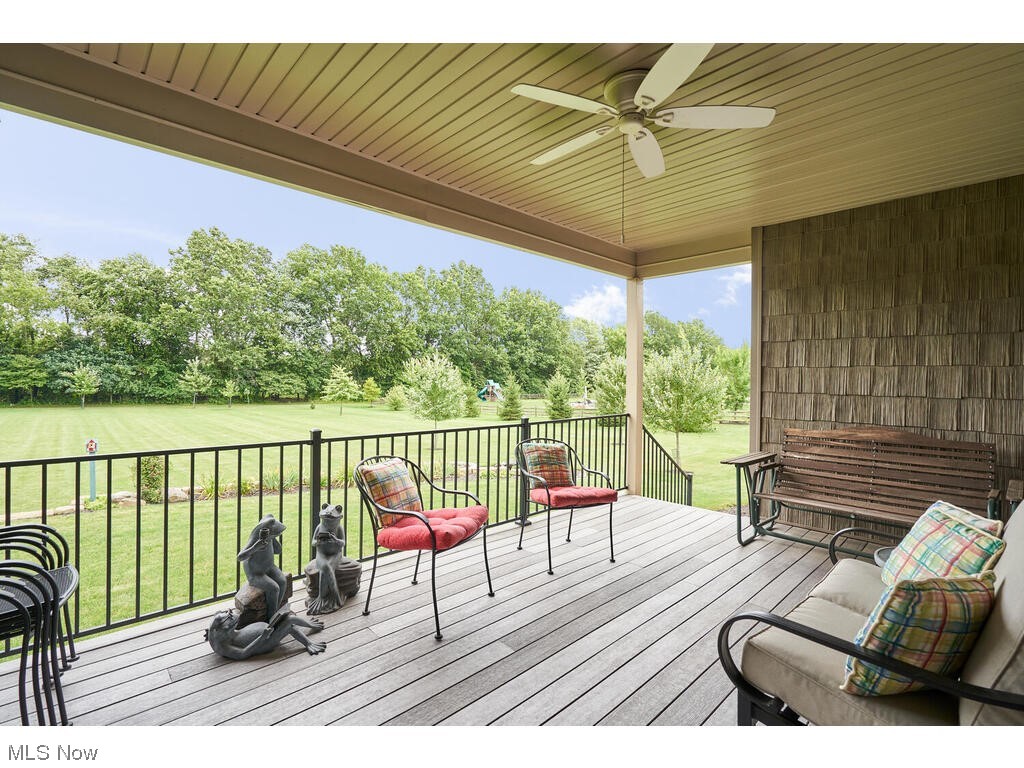 5677 Spring Ridge Drive Medina, OH 44256 - Photo 15 of 33 Covered trex deck to enjoy the quiet back yard.