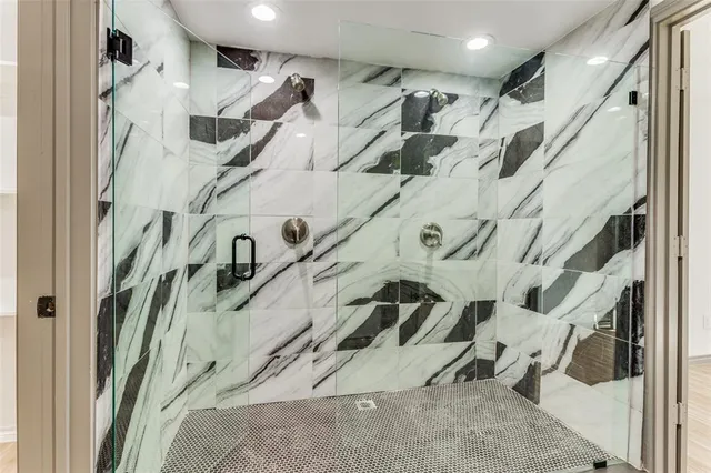 a view of a staircase with white walls