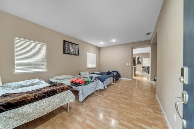 a kitchen with a sink and a stove top oven