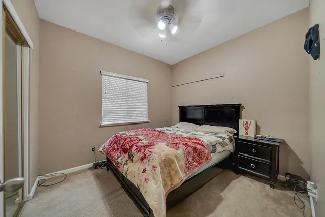 a bathroom with a double vanity sink a mirror and shower