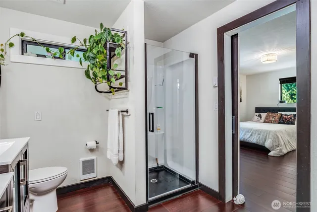 a en suite bathroom with a sink toilet and shower