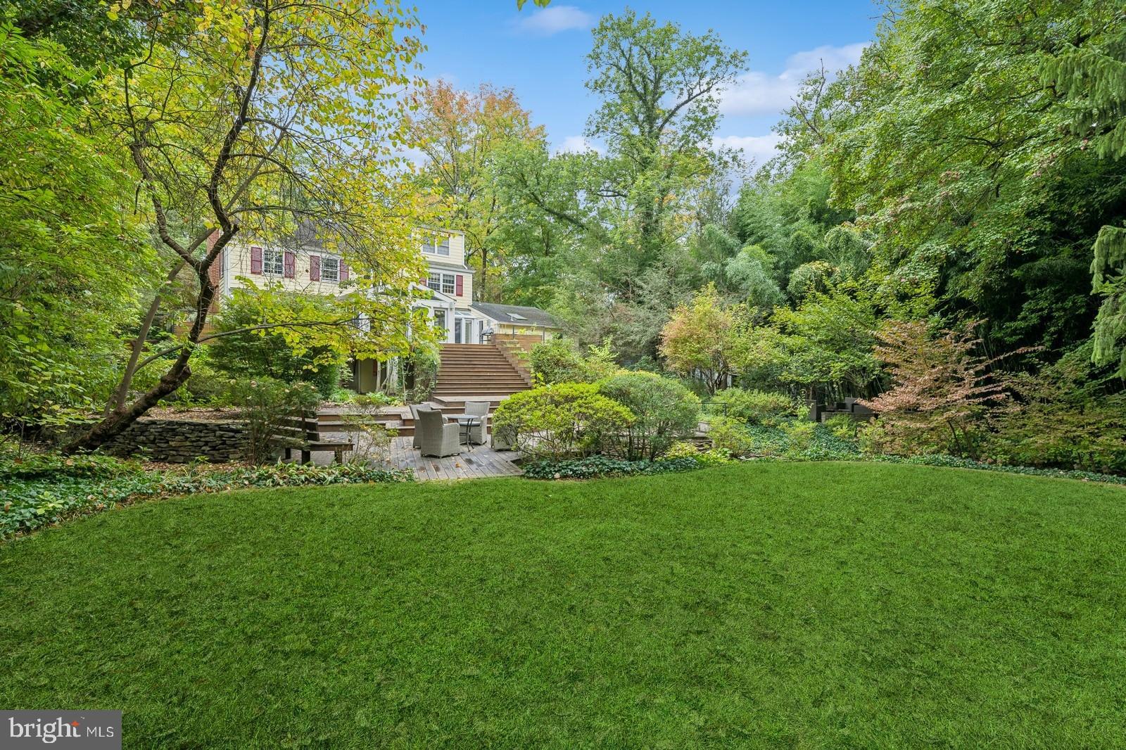 81 Westcott Road Princeton, NJ 08540 - Photo 54 of 59 a view of a garden with an outdoor space