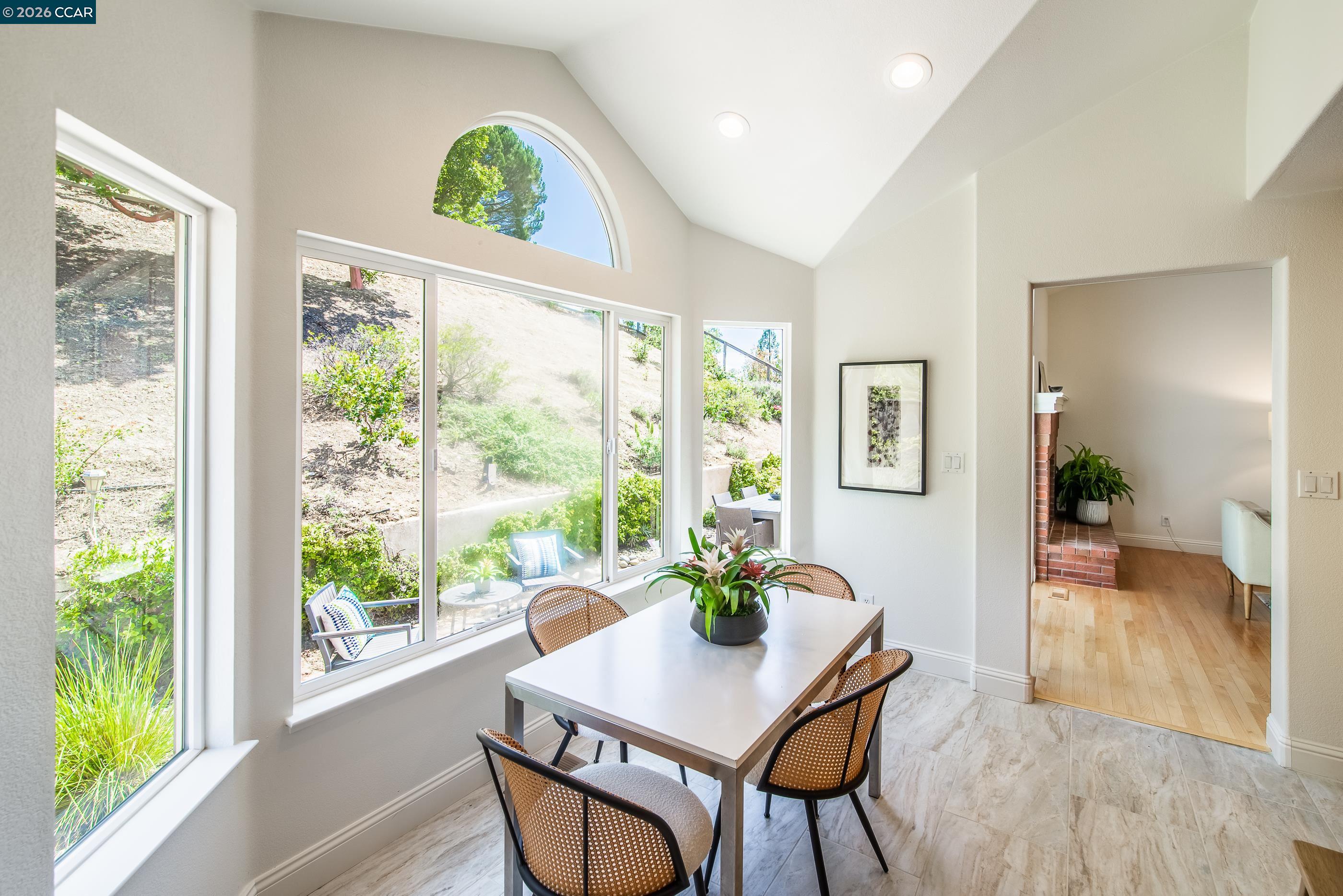 1170 Sunrise Ridge Drive Lafayette, CA 94549 - Photo 12 of 45 a view of a dining room with furniture window and wooden floor