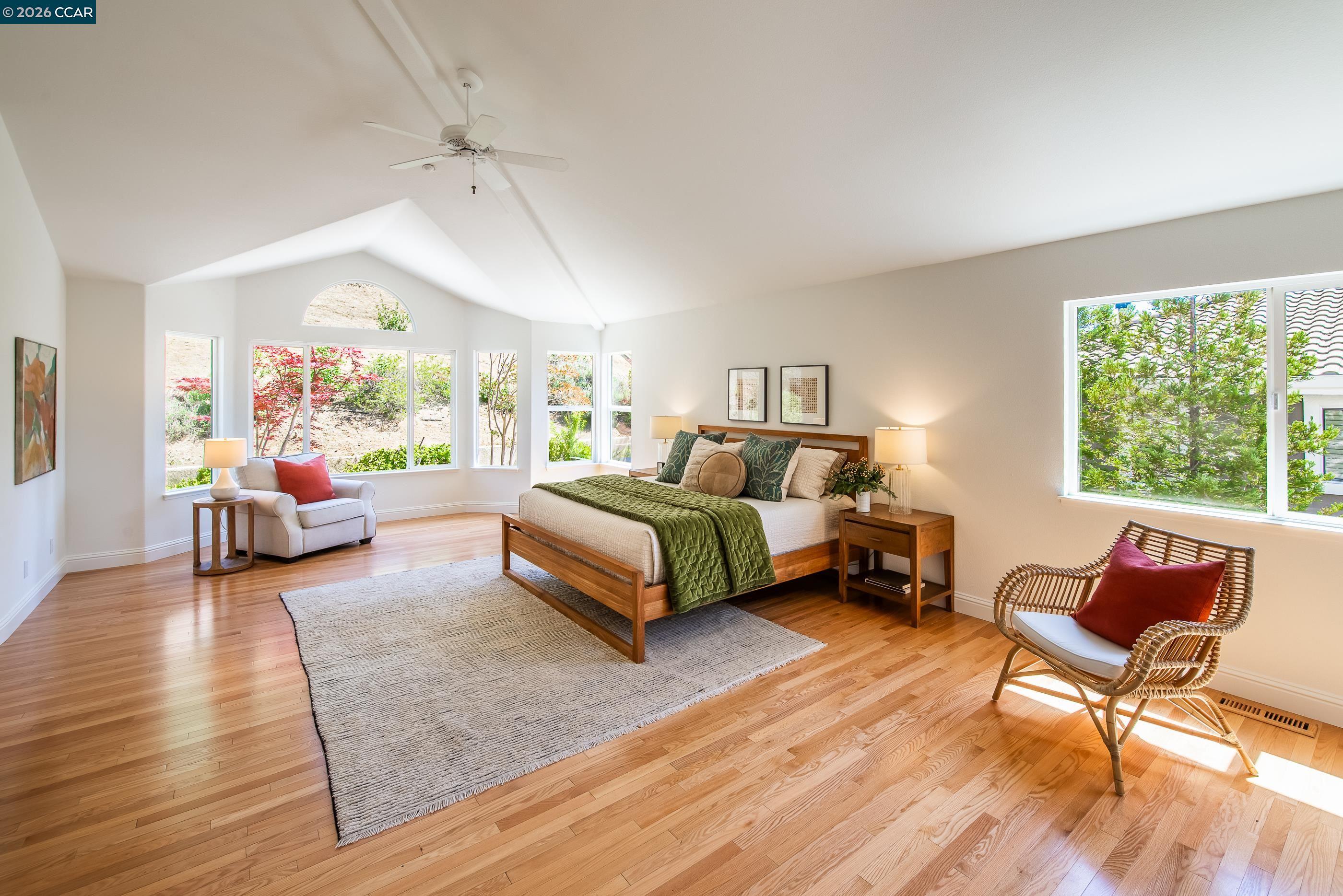 1170 Sunrise Ridge Drive Lafayette, CA 94549 - Photo 22 of 45 a bedroom with a bed and a chair