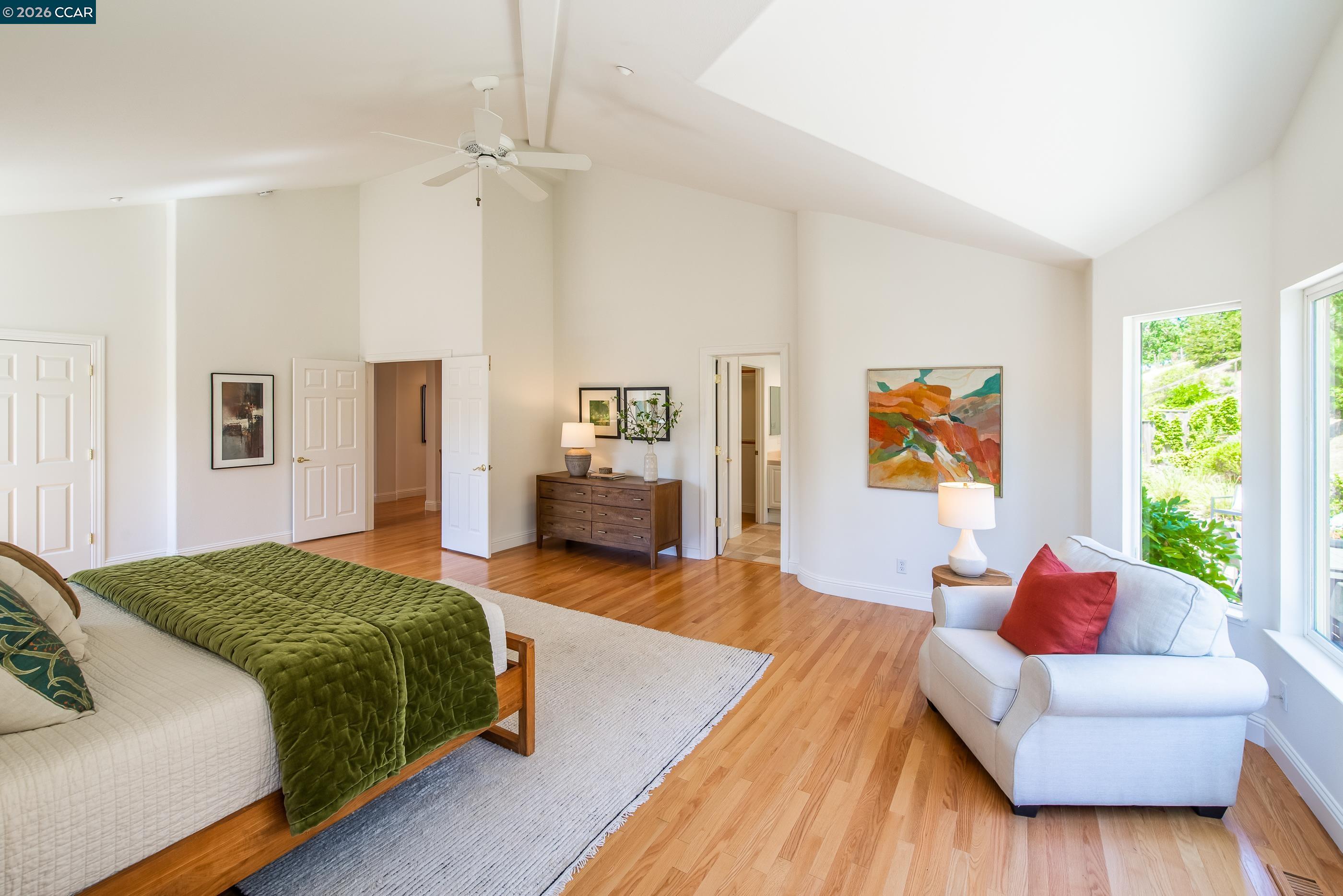 1170 Sunrise Ridge Drive Lafayette, CA 94549 - Photo 26 of 45 a spacious bedroom with a bed and a couch