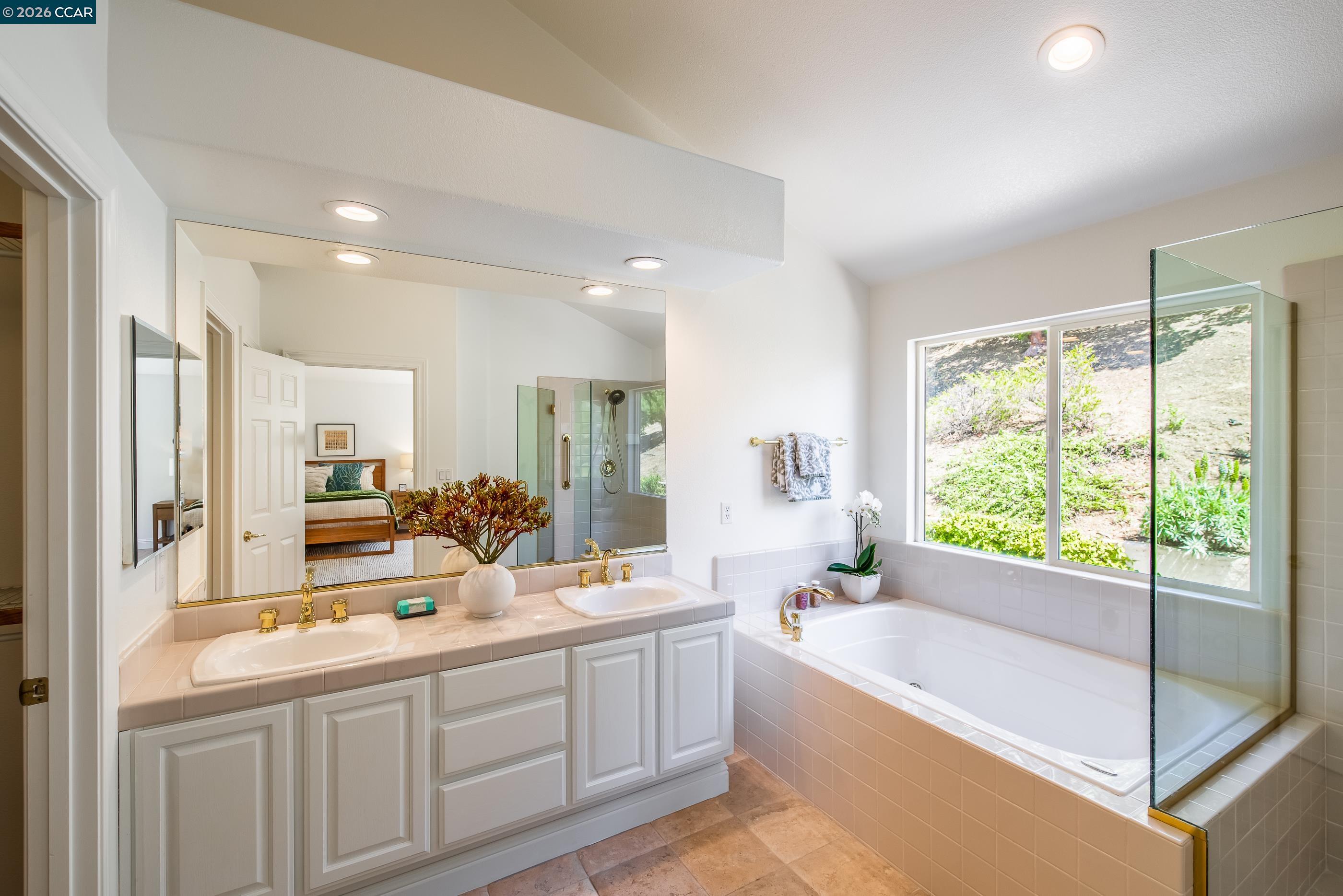1170 Sunrise Ridge Drive Lafayette, CA 94549 - Photo 27 of 45 a bathroom with a large tub sink and vanity