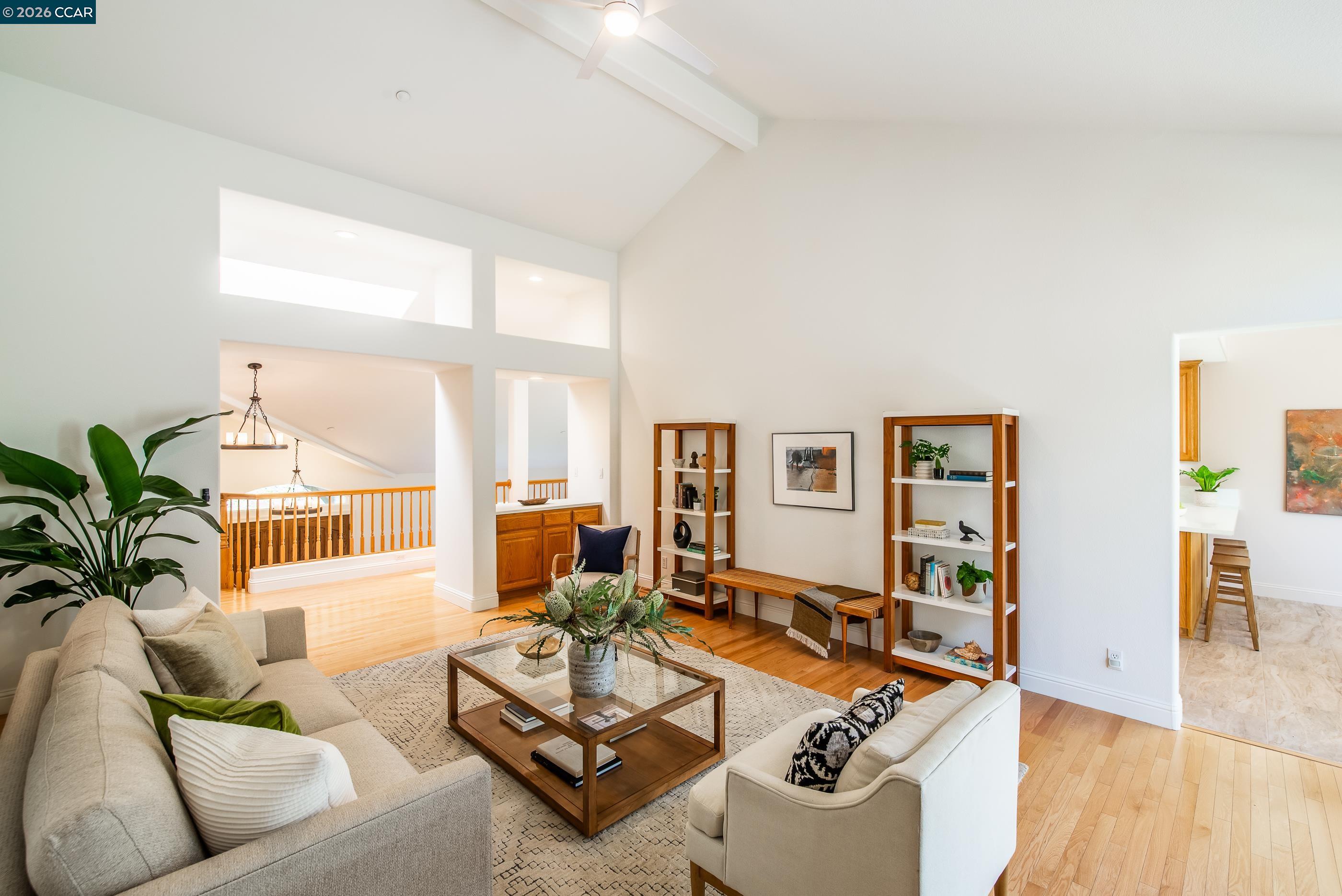 1170 Sunrise Ridge Drive Lafayette, CA 94549 - Photo 9 of 45 a living room with furniture hard wood floor and a table