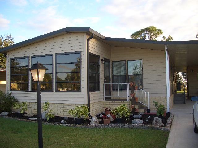 2644 Southwest Monarch Trail Stuart, FL 34997 - Photo 1 of 13 Outside Front
