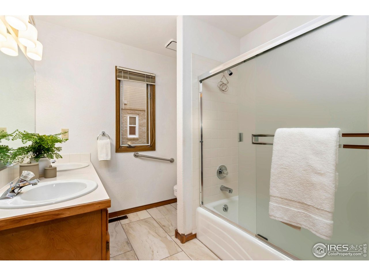 1531 West Swallow Road, Unit 25 Fort Collins, CO 80526 - Photo 19 of 39 Dual vanity in guest bath