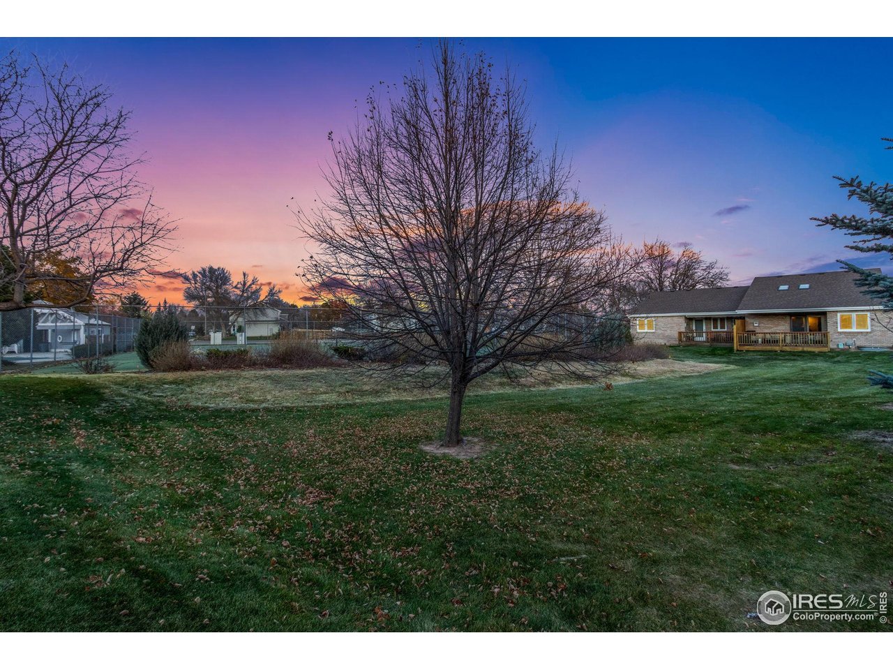 1531 West Swallow Road, Unit 25 Fort Collins, CO 80526 - Photo 29 of 39 Newer composite deck backing to HOA maintained open space