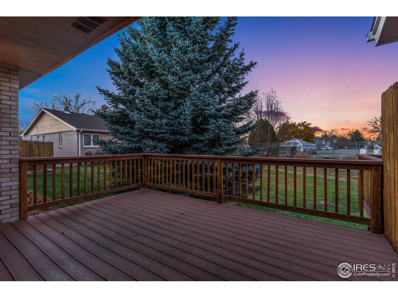 1531 West Swallow Road, Unit 25 Fort Collins, CO 80526 - Photo 4 of 39 Newer composite deck backing to HOA maintained open space