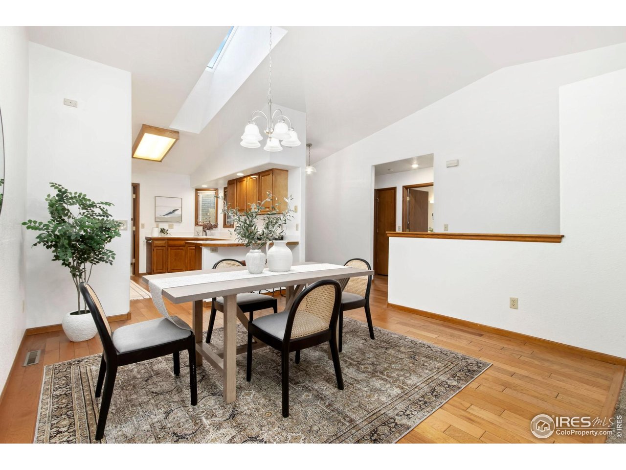 1531 West Swallow Road, Unit 25 Fort Collins, CO 80526 - Photo 37 of 39 Vaulted ceilings and open floorplan. New skylight and roof!