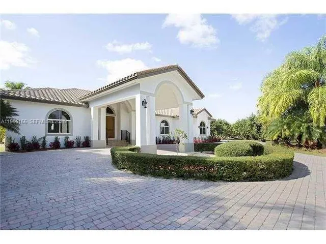 a view of a house with a patio