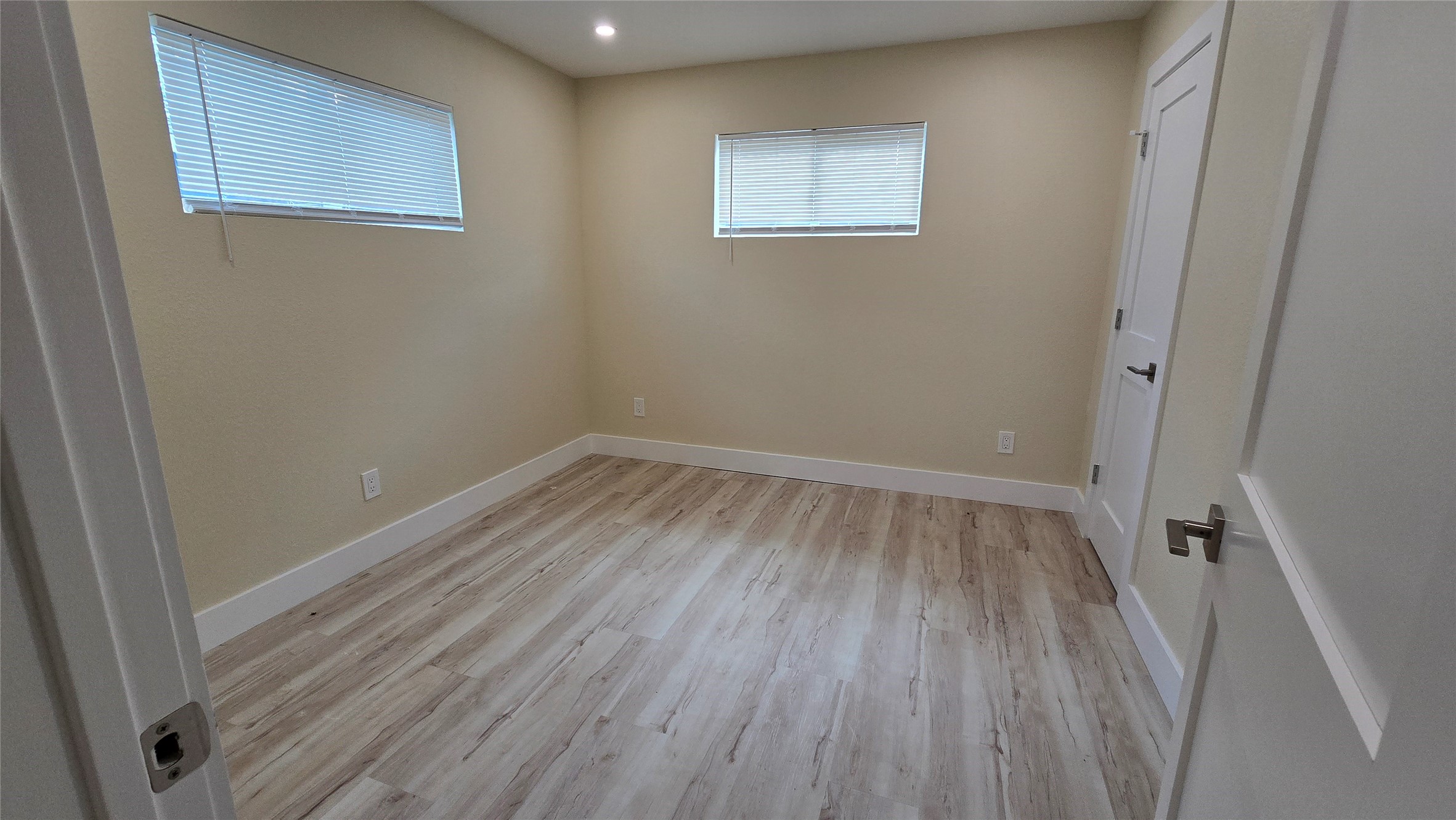 3741 Seabrook Street Houston, TX 77021 - Photo 42 of 50 a room with a wooden floor and white walls