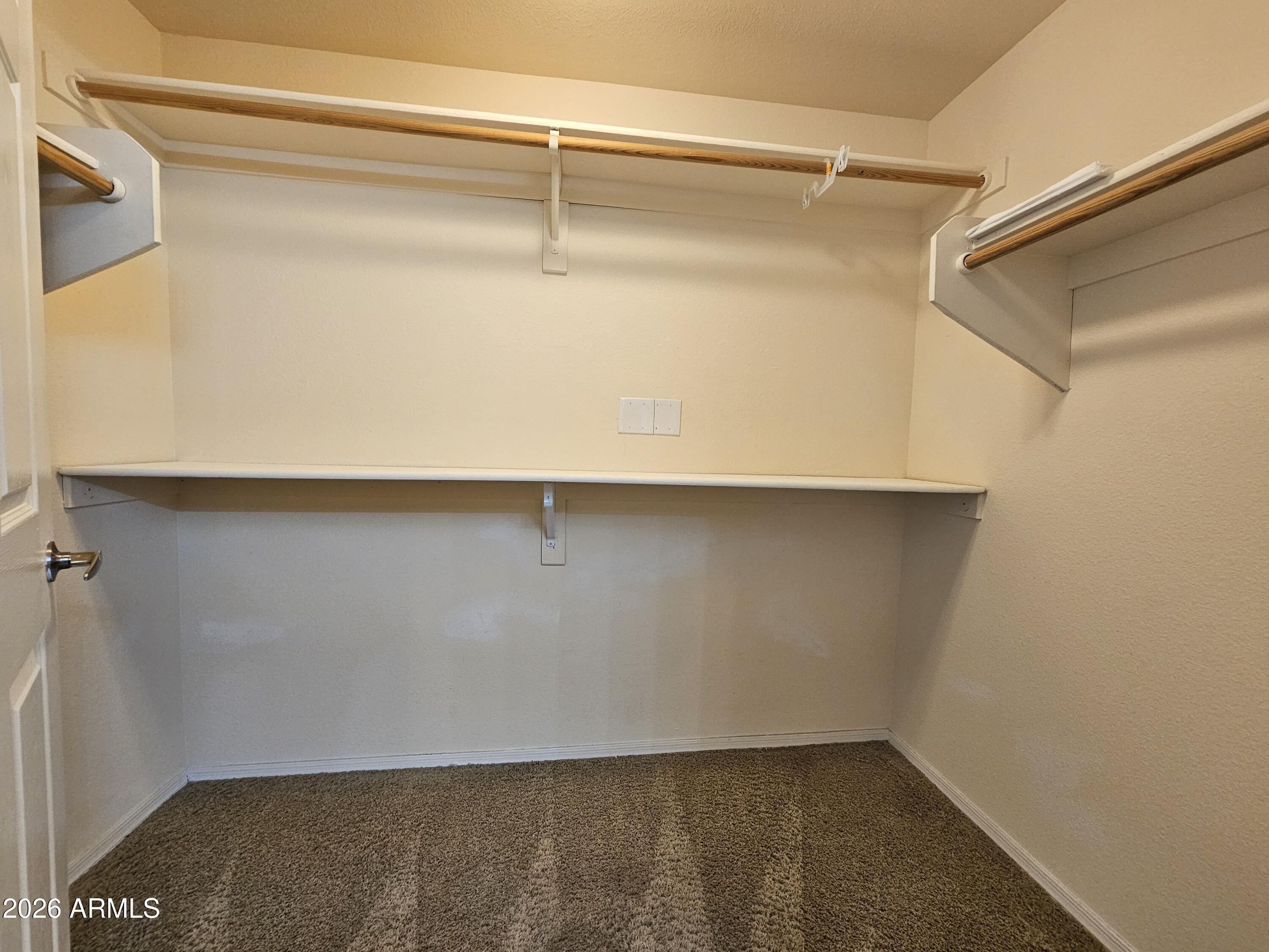 18416 North Cave Creek Road, Unit 1041 Phoenix, AZ 85032 - Photo 8 of 13 a close view of closet