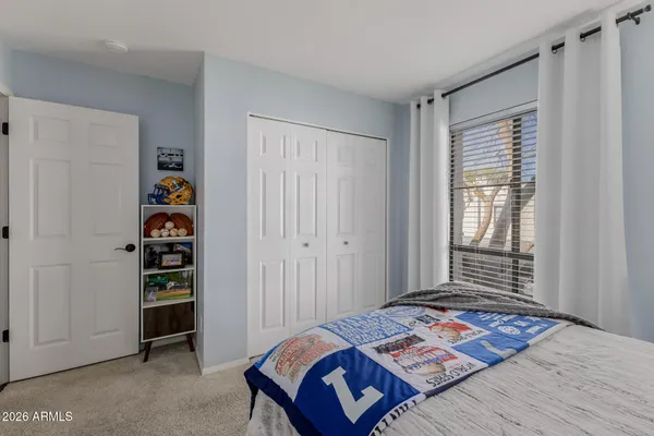 a utility room with sink dryer and washer