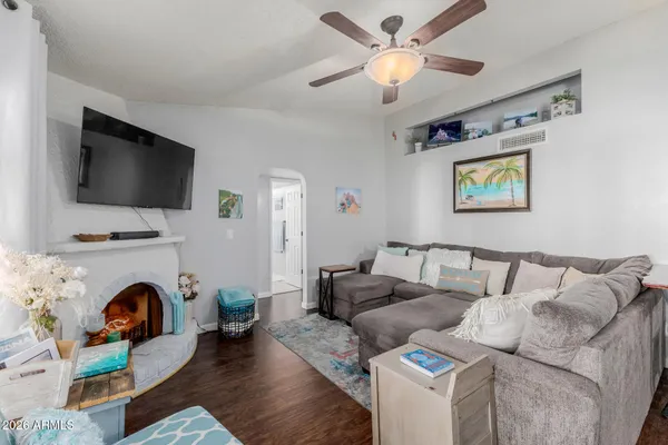 a living room with furniture and a couch